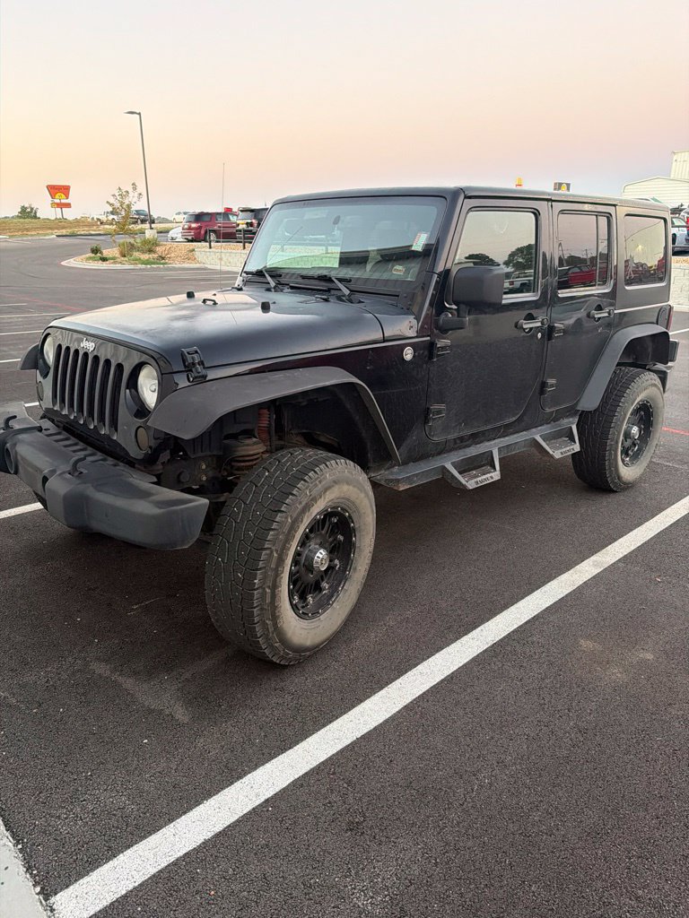 Used 2013 Jeep Wrangler Unlimited Sport AWD/4WD image 1
