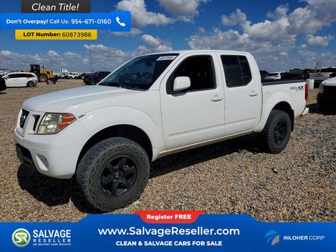 Used 2012 Nissan Frontier PRO-4X AWD/4WD image 1