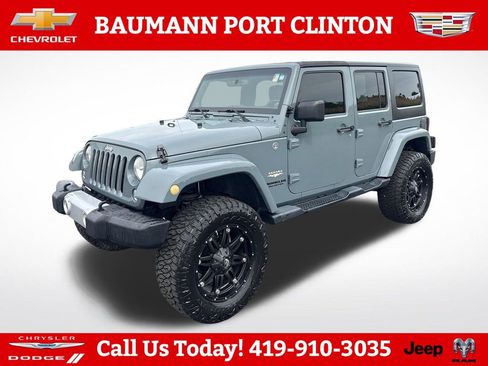 Used 2014 Jeep Wrangler Unlimited Sahara w/ Dual Top Group AWD/4WD image 2