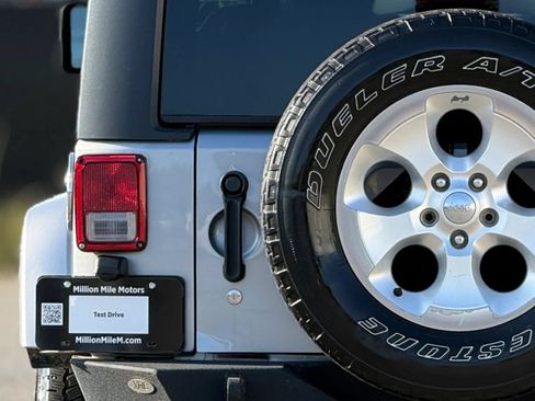 Used 2014 Jeep Wrangler Sahara w/ Dual Top Group AWD/4WD image 13