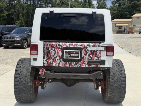 Used 2015 Jeep Wrangler Unlimited Rubicon w/ Dual Top Group AWD/4WD image 6