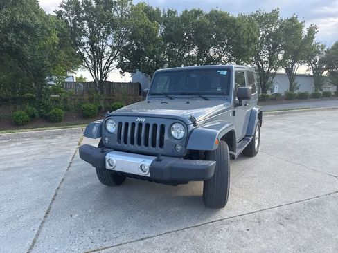 Used 2014 Jeep Wrangler Sahara w/ Connectivity Group AWD/4WD image 1