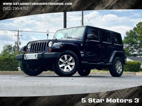Used 2013 Jeep Wrangler Unlimited Sahara w/ Max Tow Pkg AWD/4WD image 1