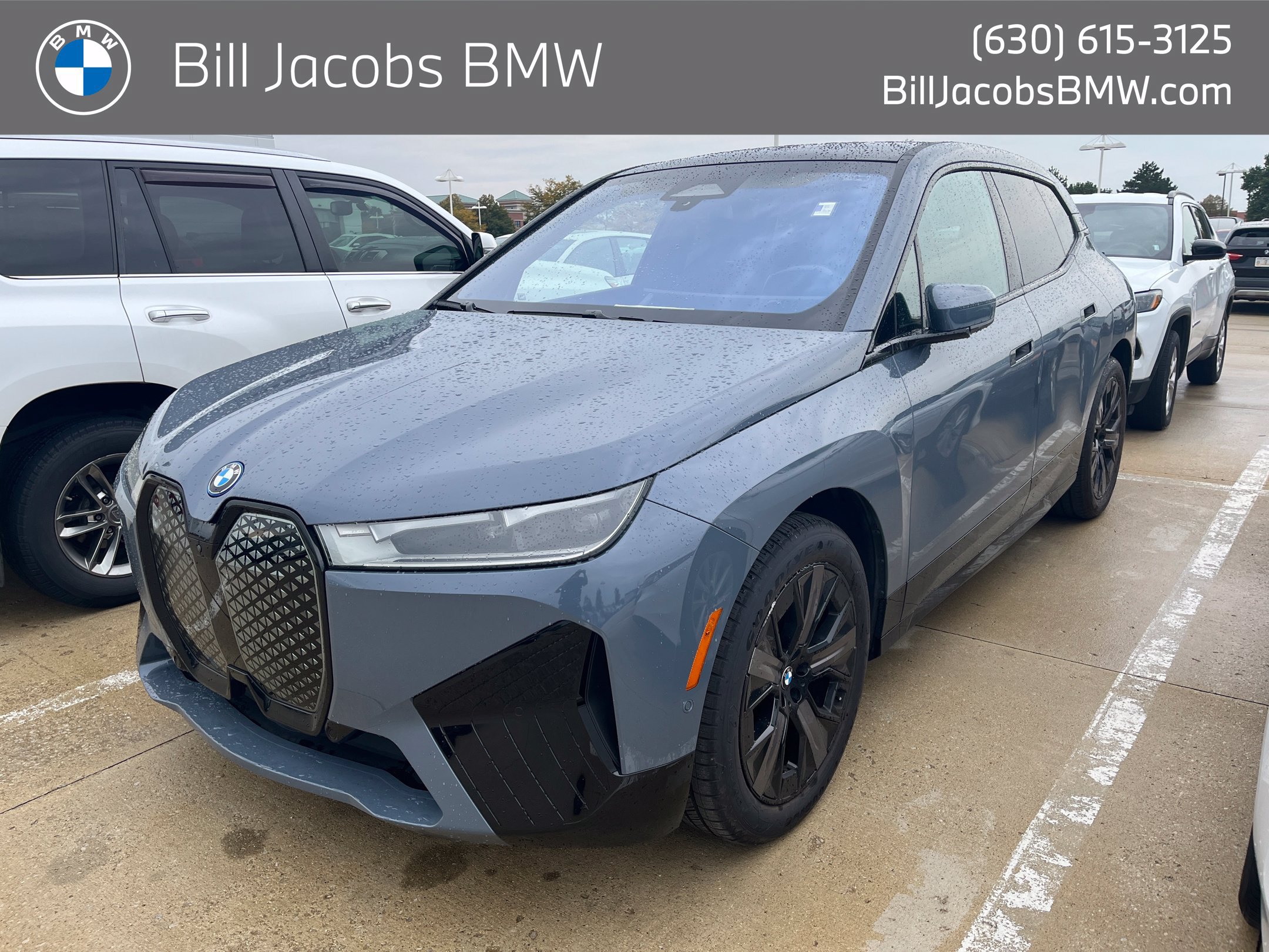 Used 2024 BMW iX xDrive50 w/ Premium Package AWD/4WD image 1