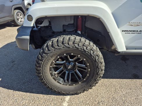 Used 2014 Jeep Wrangler Unlimited Sahara w/ Max Tow Package AWD/4WD image 23