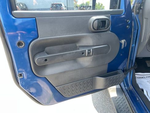 Used 2010 Jeep Wrangler Unlimited Sahara w/ Dual Top Group AWD/4WD image 11