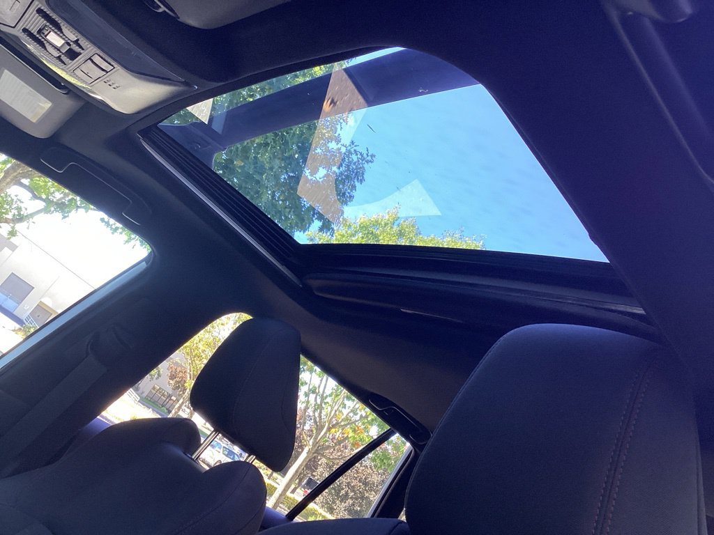 Used 2021 Toyota RAV4 SE w/ Weather & Moonroof Package AWD/4WD image 3