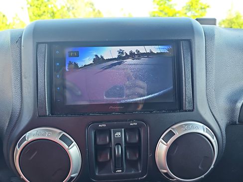 Used 2013 Jeep Wrangler Unlimited Sahara w/ Dual Top Group AWD/4WD image 23