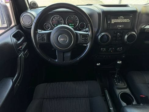 Used 2012 Jeep Wrangler Unlimited Sport AWD/4WD image 28
