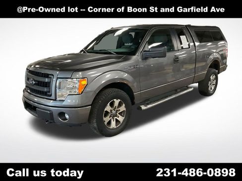 Used 2013 Ford F150 STX w/ Mid Equipment Group AWD/4WD image 1