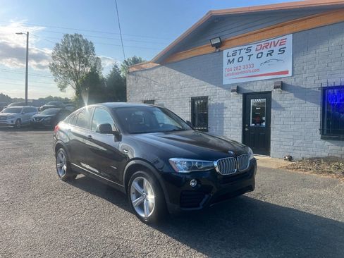 Used 2016 BMW X4 xDrive35i AWD/4WD image 1