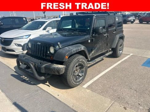 Used 2012 Jeep Wrangler Unlimited Sport AWD/4WD image 1