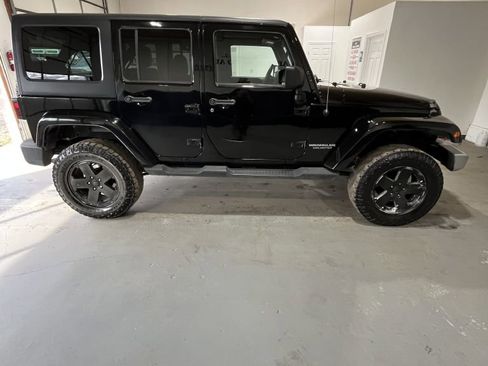 Used 2012 Jeep Wrangler Unlimited Sahara w/ Dual Top Group image 2