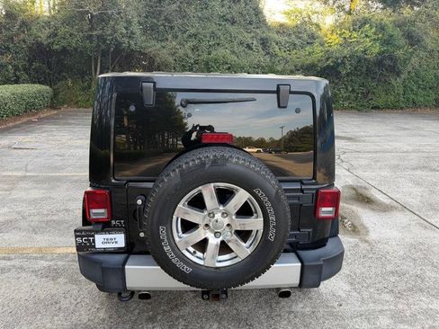 Used 2013 Jeep Wrangler Unlimited Sahara w/ Dual Top Group image 9