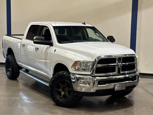 Used 2014 RAM 2500 SLT w/ Luxury Group AWD/4WD image 2