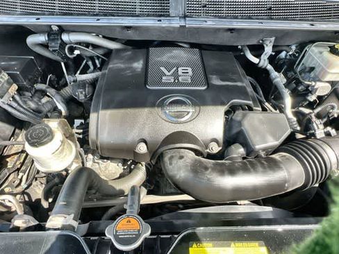 Used 2015 Nissan Armada Platinum w/ 2nd Row Captain Seat Package AWD/4WD image 10