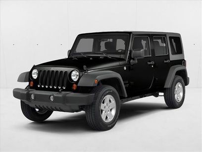 Used 2014 Jeep Wrangler Unlimited Rubicon w/ Dual Top Group