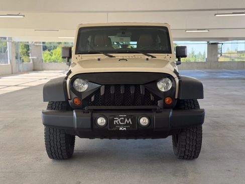 Used 2011 Jeep Wrangler Unlimited Rubicon w/ Dual Top Group AWD/4WD image 2