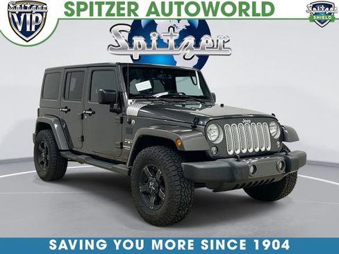Used 2017 Jeep Wrangler Unlimited Sahara w/ Dual Top Group AWD/4WD image 1
