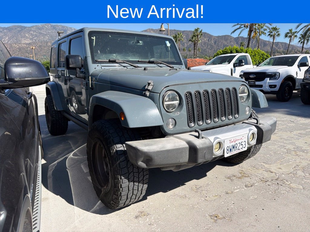 Used 2015 Jeep Wrangler Unlimited Sahara AWD/4WD image 1