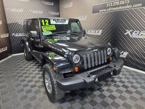 Used 2012 Jeep Wrangler Unlimited Rubicon w/ Dual Top Group AWD/4WD image 6