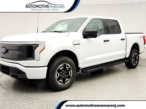 Used 2022 Ford F150 Lightning XLT AWD/4WD image 1