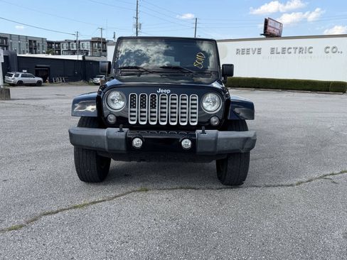 Used 2016 Jeep Wrangler Unlimited Sahara w/ Dual Top Group AWD/4WD image 25
