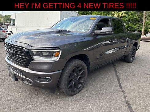 Used 2023 RAM 1500 Laramie AWD/4WD image 1