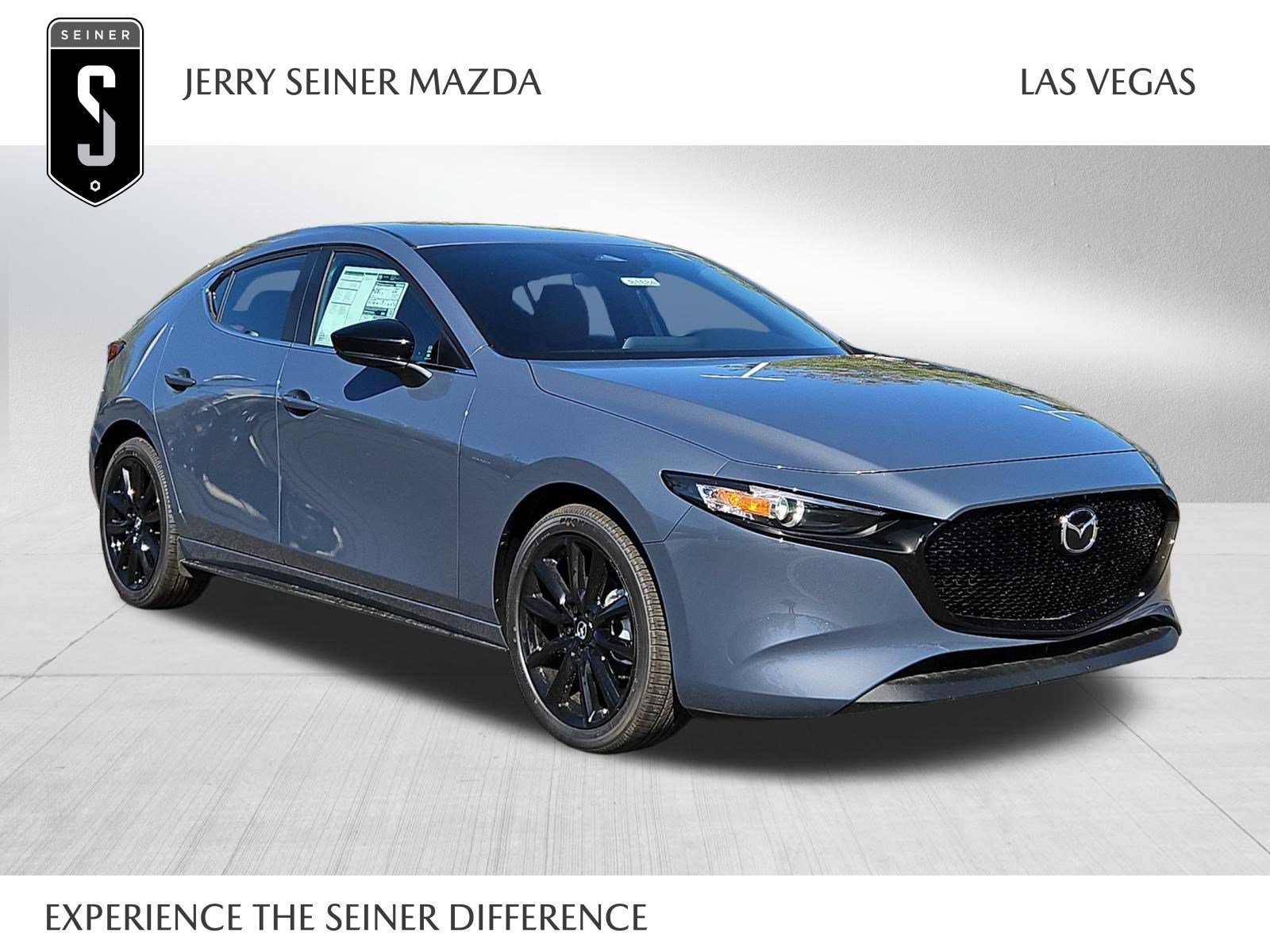 New 2026 MAZDA MAZDA3 Carbon AWD/4WD image 1