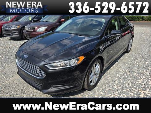 Used 2015 Ford Fusion SE FWD image 1