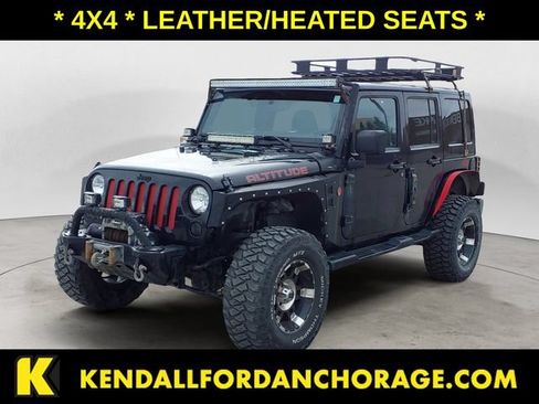 Used 2012 Jeep Wrangler Unlimited Sahara AWD/4WD image 1