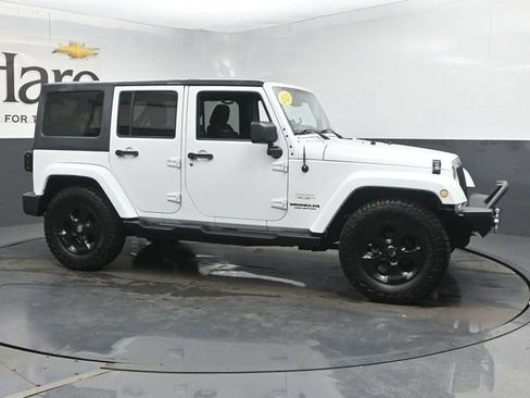 Used 2013 Jeep Wrangler Unlimited Sahara w/ Dual Top Group AWD/4WD image 1