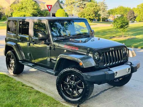Used 2014 Jeep Wrangler Unlimited Sahara w/ Connectivity Group AWD/4WD image 1