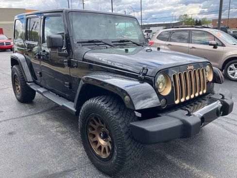 Used 2014 Jeep Wrangler Unlimited Sahara AWD/4WD image 2
