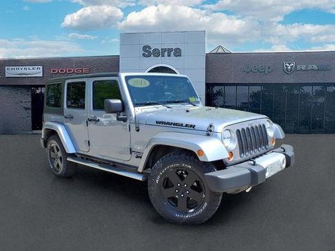 Used 2013 Jeep Wrangler Unlimited Sahara w/ Dual Top Group AWD/4WD image 1