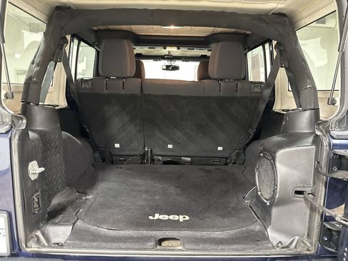 Used 2013 Jeep Wrangler Unlimited Sahara w/ Dual Top Group AWD/4WD image 21