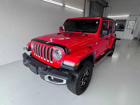 Used 2019 Jeep Wrangler Unlimited Sahara w/ Dual Top Group AWD/4WD image 1