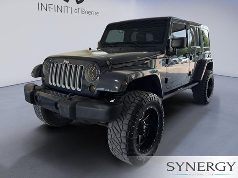 Used 2016 Jeep Wrangler Unlimited Sahara w/ Max Tow Package AWD/4WD image 1