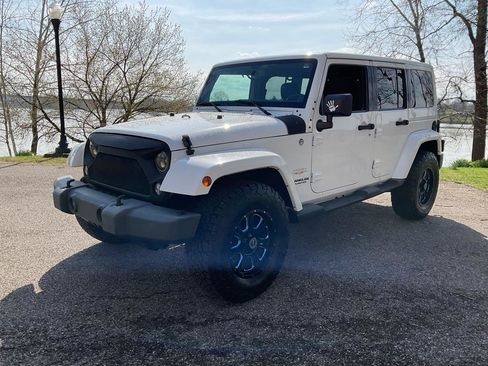 Used 2014 Jeep Wrangler Unlimited Sahara w/ Max Tow Package image 1