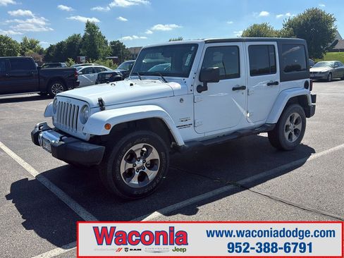 Used 2017 Jeep Wrangler Unlimited Sahara w/ Dual Top Group AWD/4WD image 1