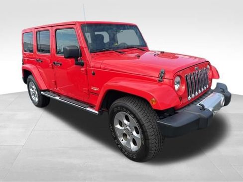 Used 2013 Jeep Wrangler Unlimited Sahara w/ Mopar Chrome Edition Group AWD/4WD image 1