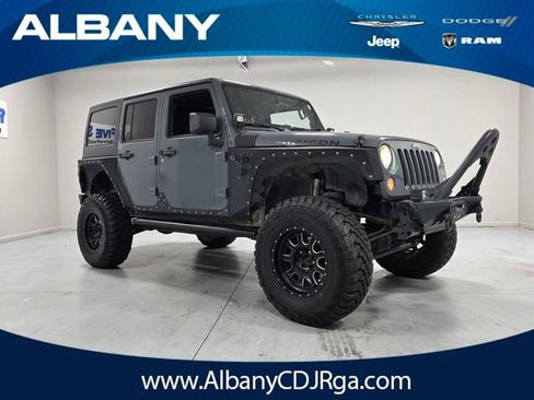 Used 2014 Jeep Wrangler Unlimited Rubicon w/ Max Tow Package AWD/4WD image 1