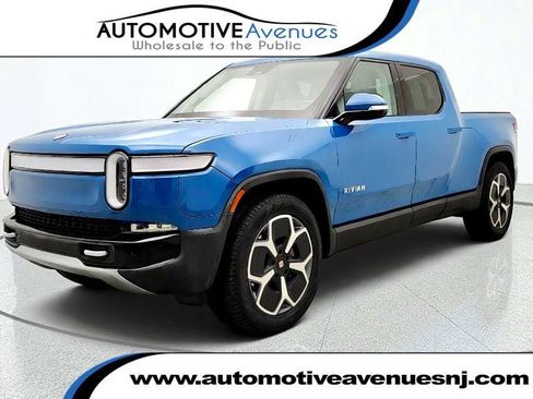 Used 2024 Rivian R1T Adventure Dual AWD/4WD image 1