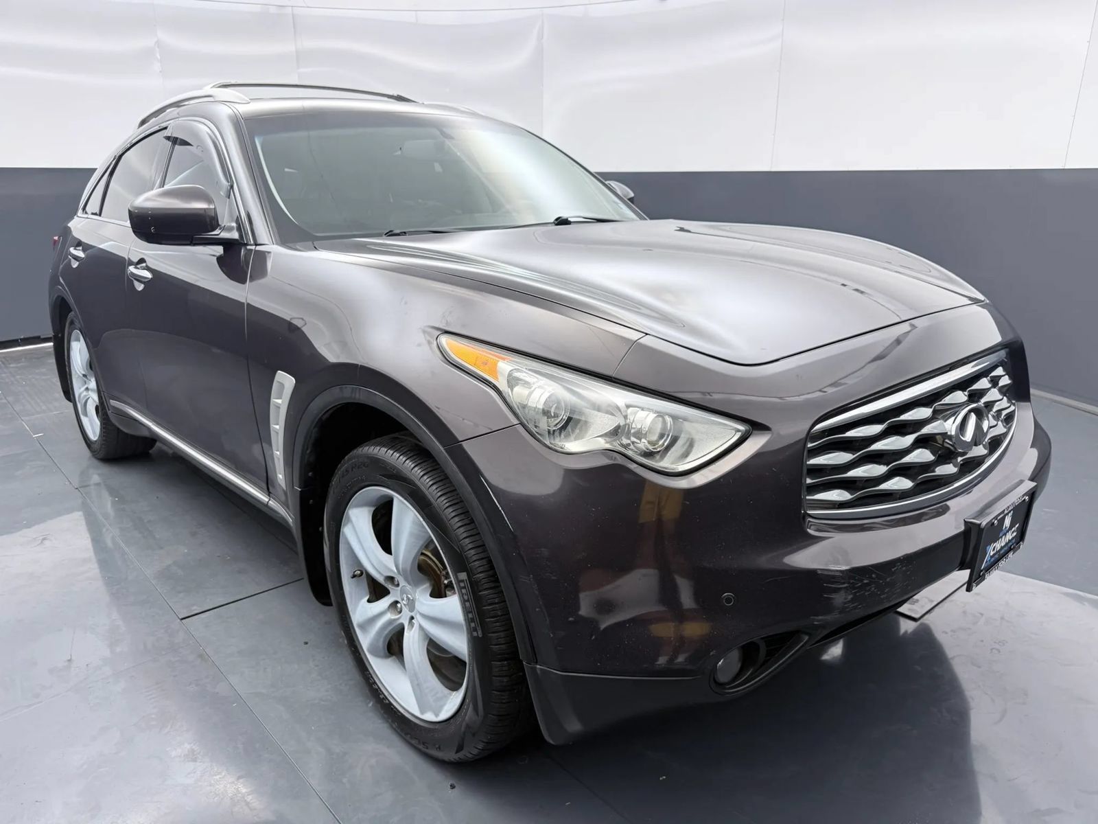 Used 2010 INFINITI FX35 AWD w/ Navigation Pkg image 1