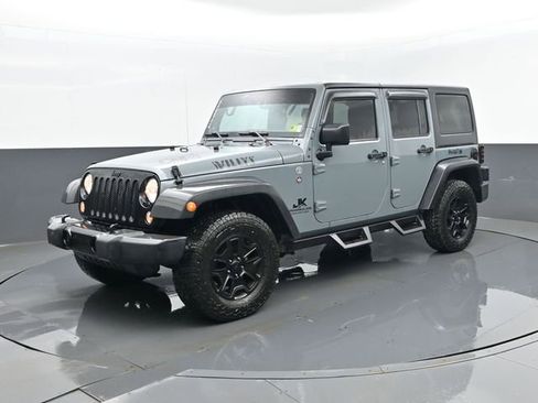 Used 2014 Jeep Wrangler Unlimited Sport image 1