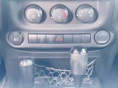 Used 2012 Jeep Wrangler Unlimited Sport AWD/4WD image 16