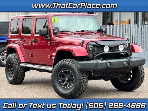 Used 2013 Jeep Wrangler Unlimited Sahara w/ Connectivity Group AWD/4WD image 1