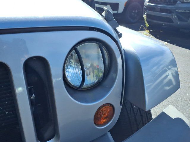 Used 2013 Jeep Wrangler Unlimited Sahara w/ Dual Top Group AWD/4WD image 12