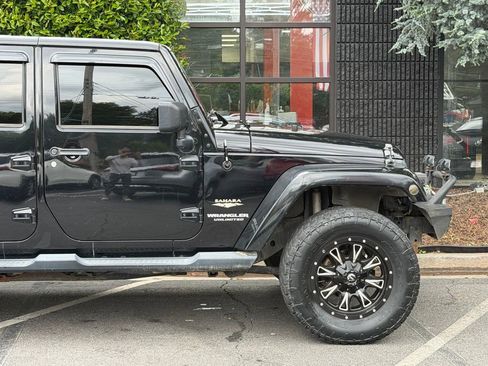 Used 2013 Jeep Wrangler Unlimited Sahara w/ Connectivity Group AWD/4WD image 24