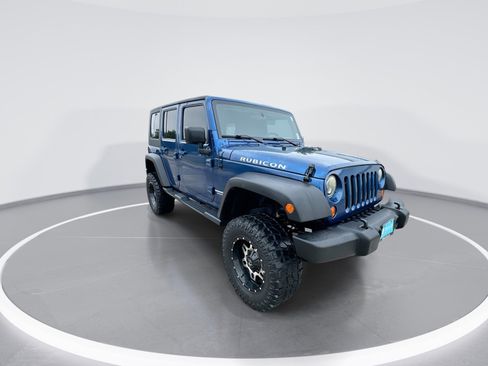 Used 2010 Jeep Wrangler Unlimited Rubicon w/ Dual Top Group AWD/4WD image 2